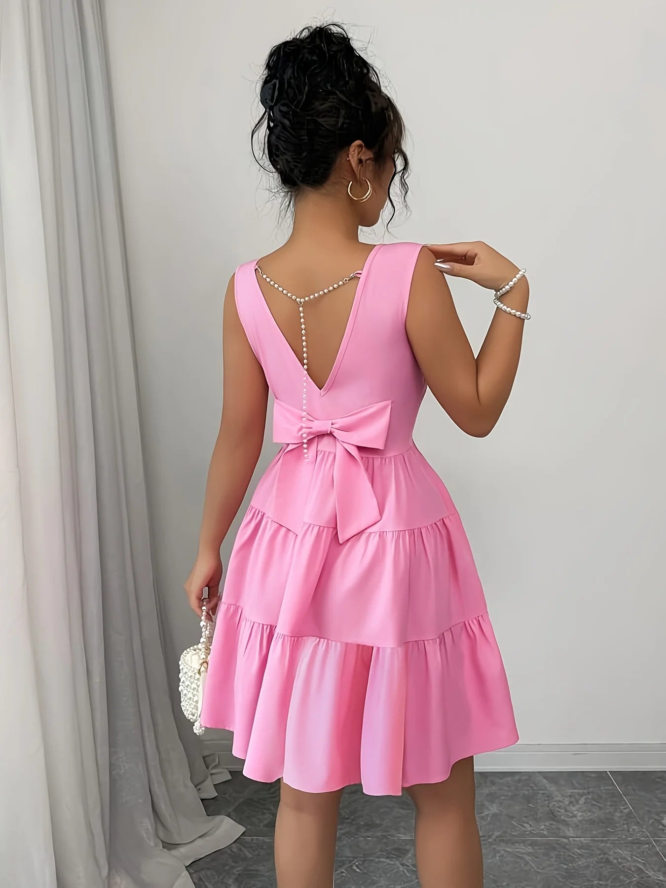 Elegant Sleeveless Midi Dress – Pearl Chain & Butterfly Knot Waist-Cinching
